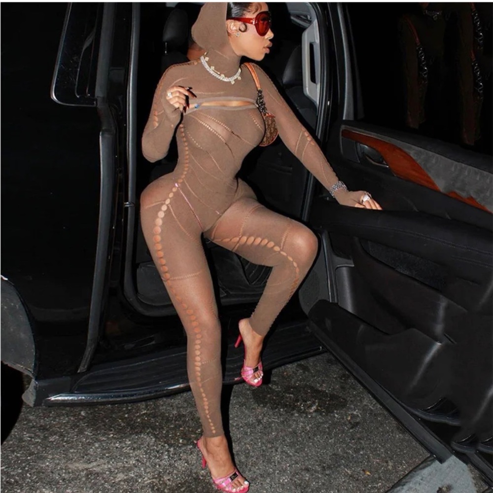 Tan one piece , spandex, with a hoodie
